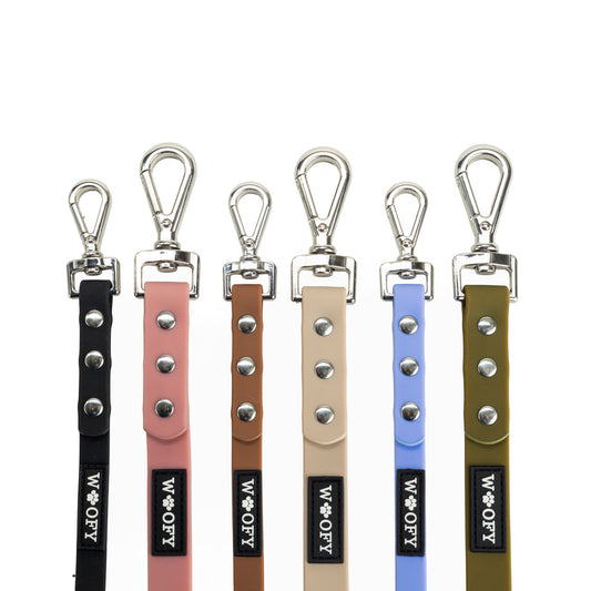 Woofyn hihnat kuudessa värissä. Lukot kahdessa eri koossa.