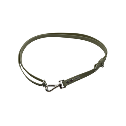 Hands-free adapteri metsänvihreässä värissä.