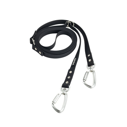 Musta twist-lock monitoimihihna.