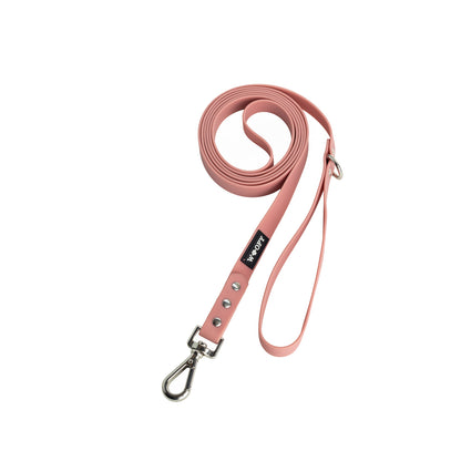 Woofyn käsilenkillinen pinkki hihna. 