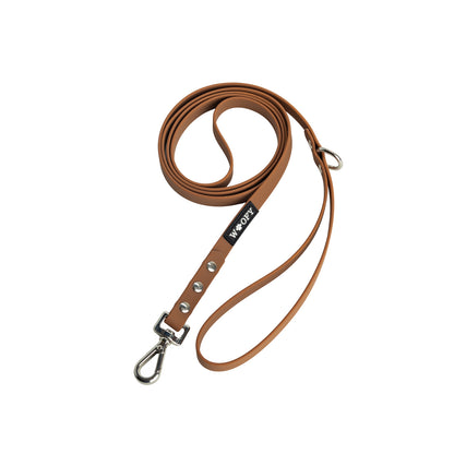 Woofyn käsilenkillinen ruskea hihna. 