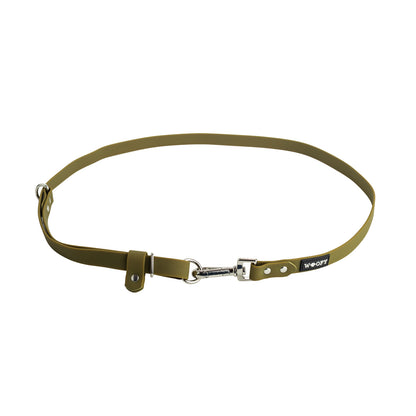 Woofyn vihreä Freepaws lisäosa hands-free kävelyyn.